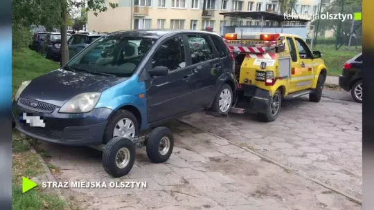 Mandaty i odholowane auta przed szkołą