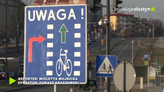 Tablica przypominająca o rowerzystach na drodze